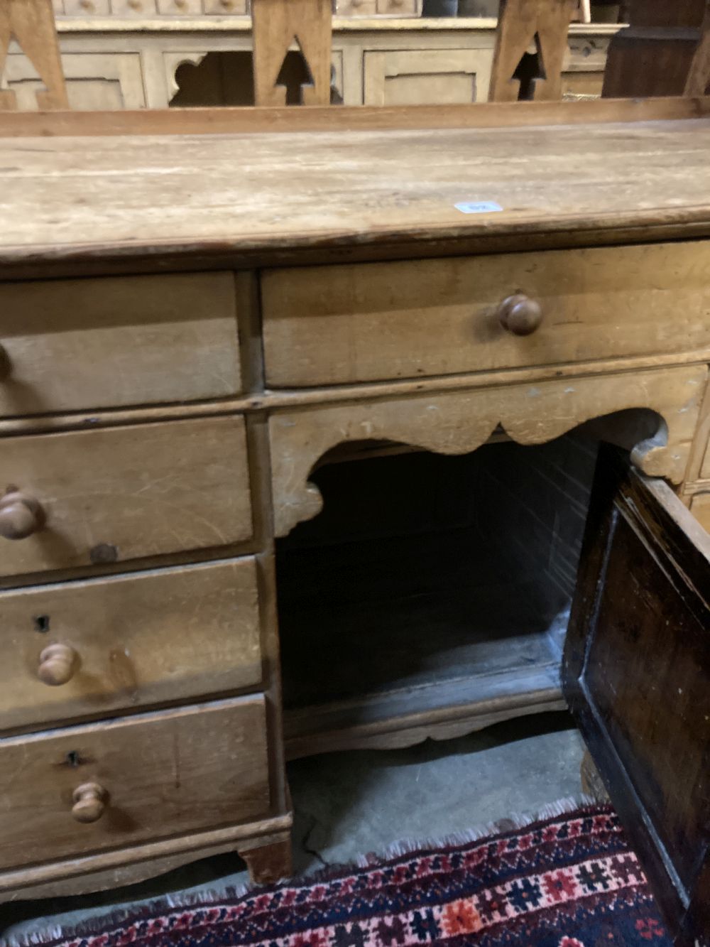A Victorian pine kneehole desk, width 128cm depth 55cm height 82cm